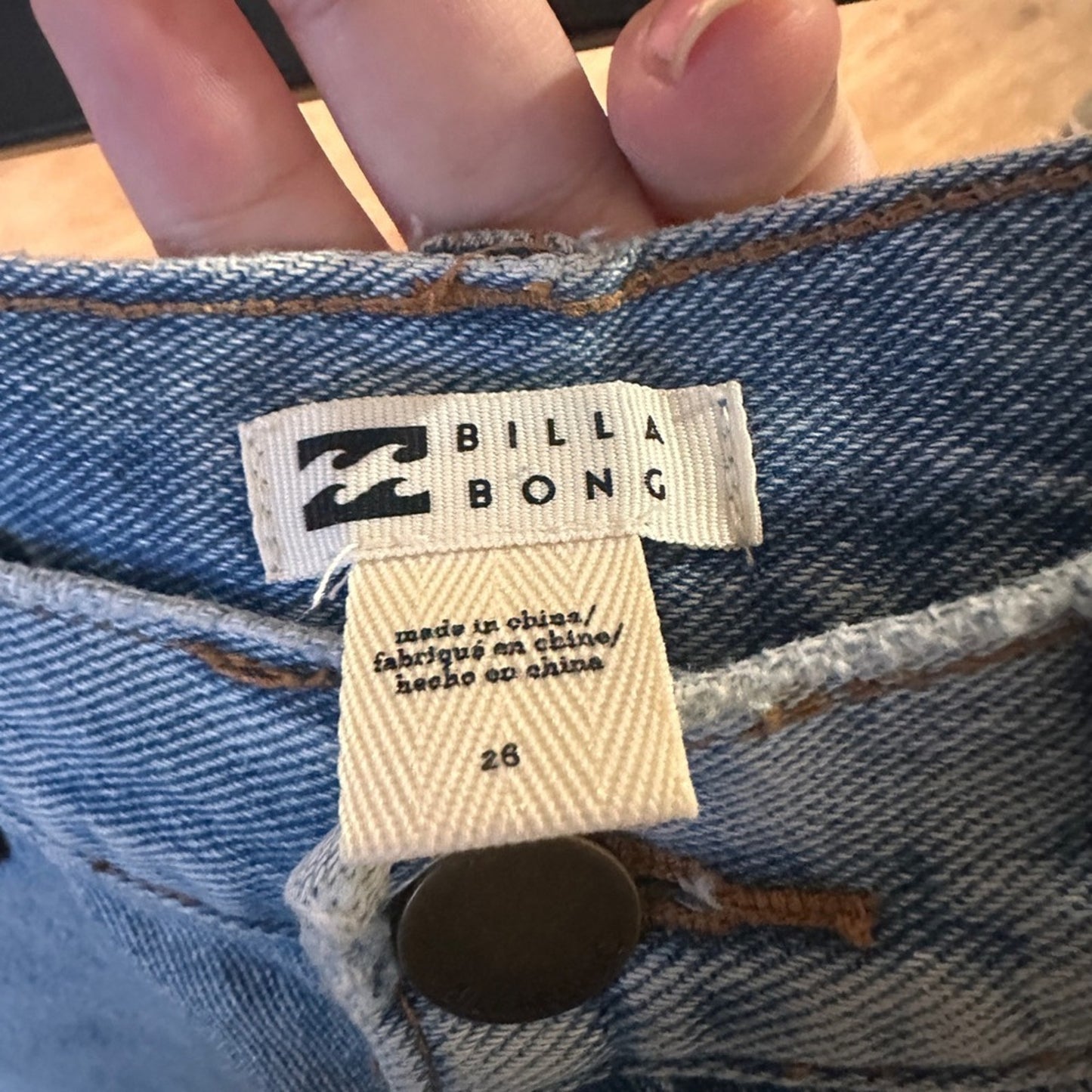 Billabong distressed denim shorts size medium