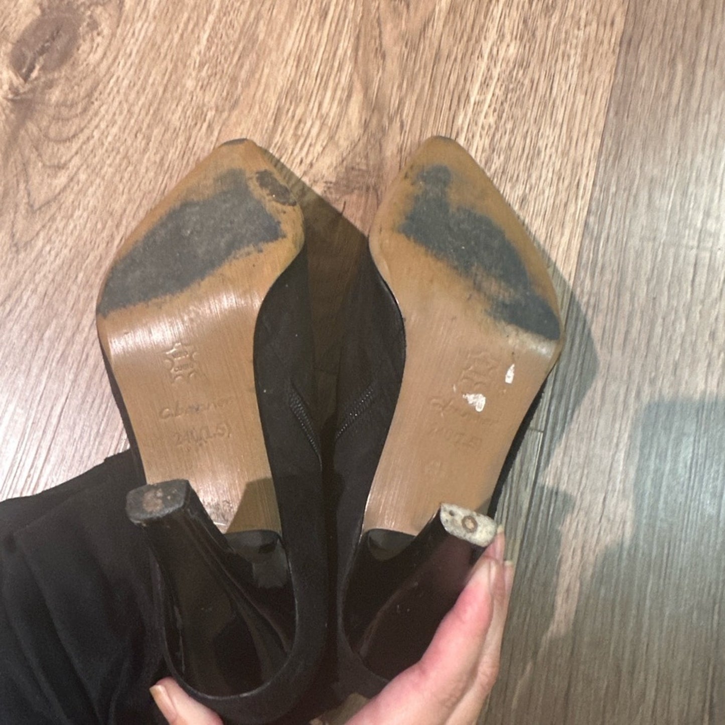 C. banner pointed toe heeled boots size 7