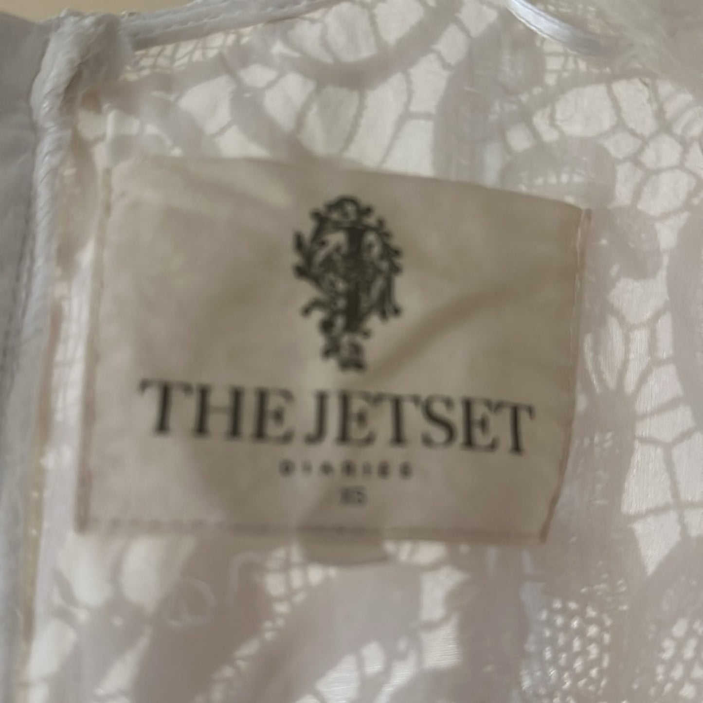 The Jetset Diaries crochet lace deep V body on dress size xs