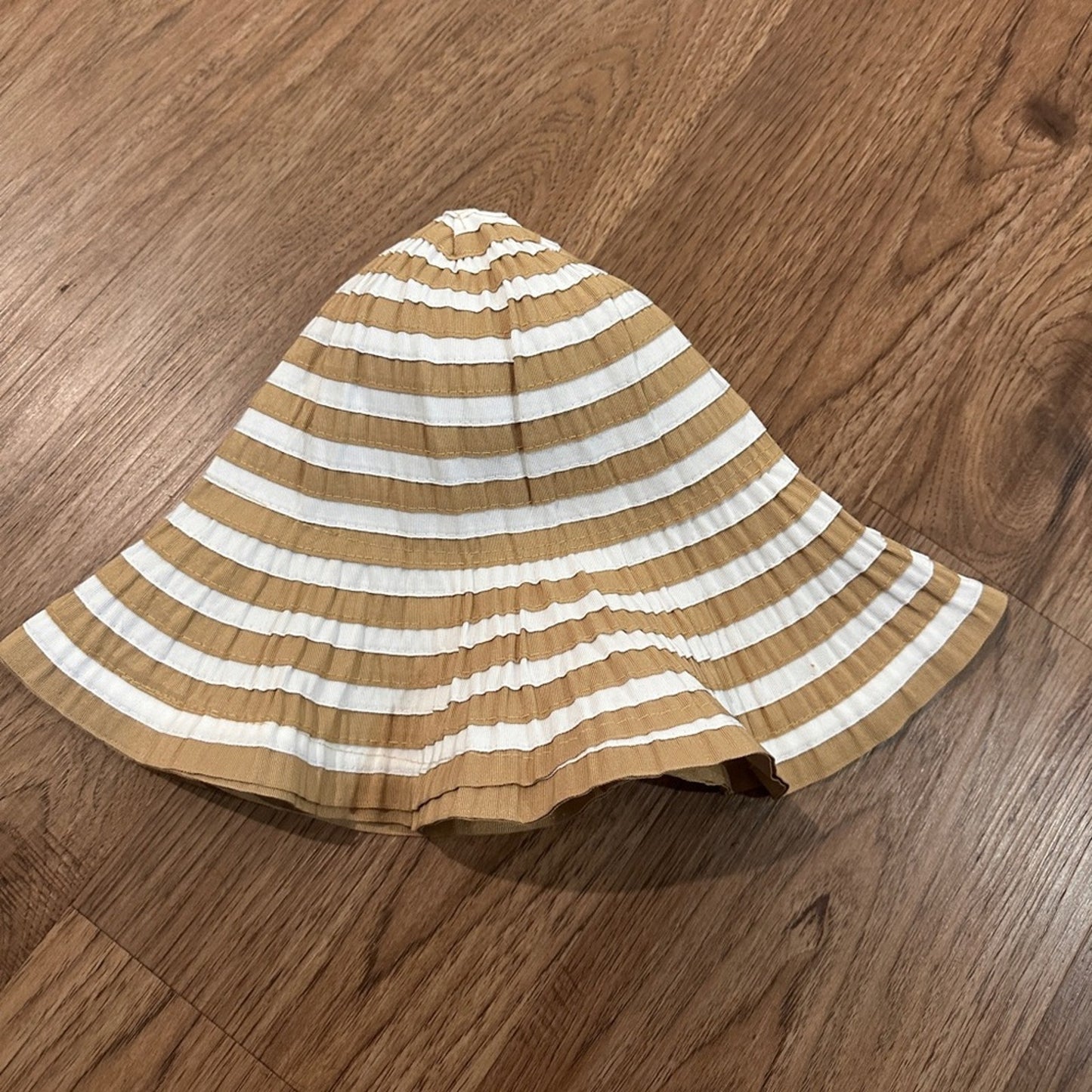 White and beige striped floppy sun hat