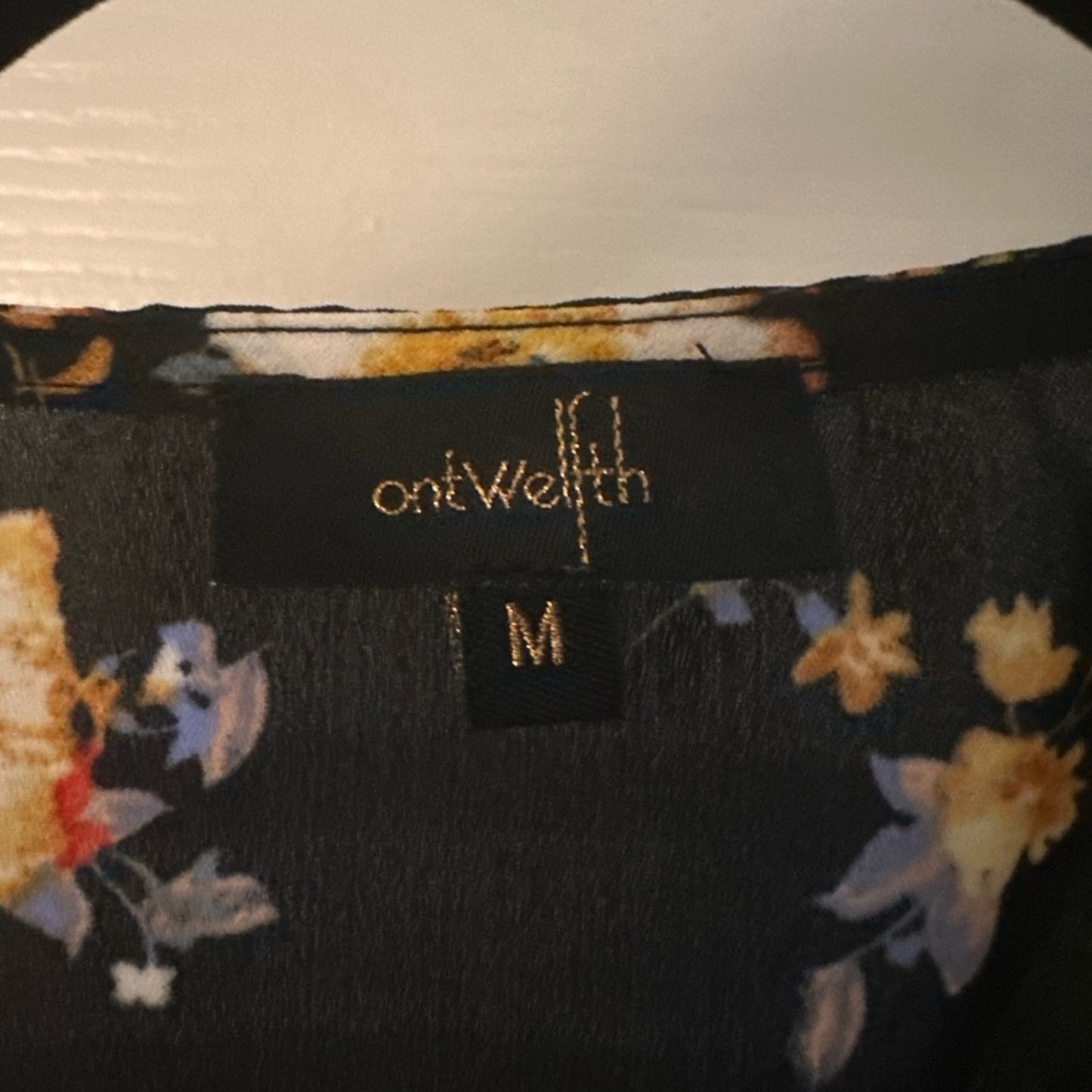 Ontwelfth black floral open back romper size medium