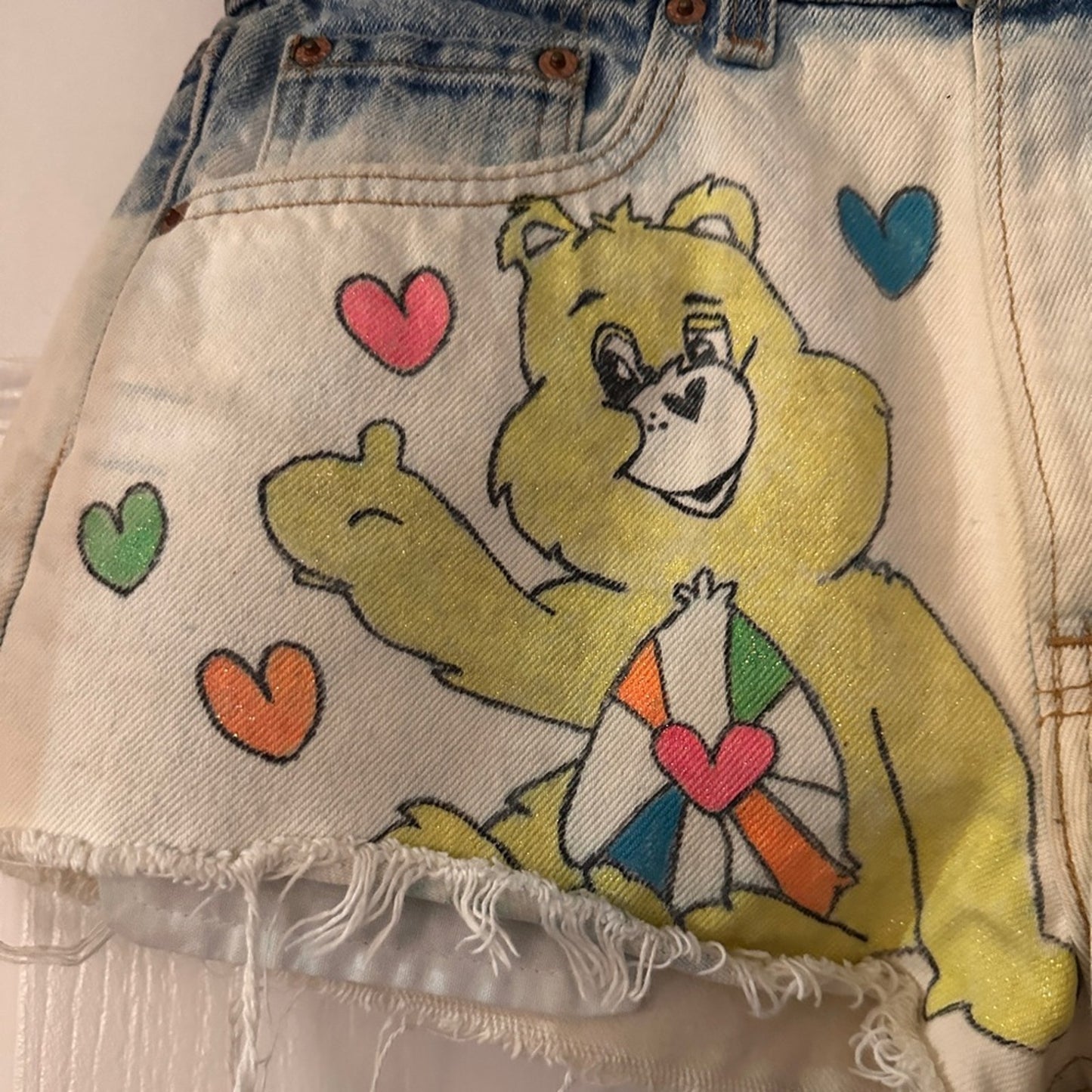 Care bear hand painted Levi’s distressed denim shorts size 28