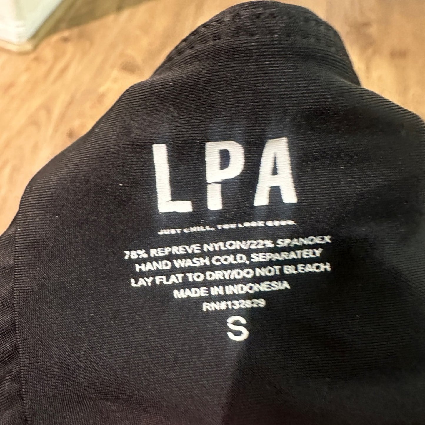 NWT LPA asymmetric one shoulder bikini top in black size small